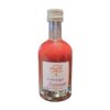 Vinaigre mangue présenté en bouteille, idéal pour assaisonner salades, crudités, poissons, volailles, marinades et recettes sucrées salées.