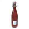 Vinaigre mangue présenté en bouteille, idéal pour assaisonner salades, crudités, poissons, volailles, marinades et recettes sucrées salées.