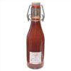 Vinaigre mangue présenté en bouteille, idéal pour assaisonner salades, crudités, poissons, volailles, marinades et recettes sucrées salées.